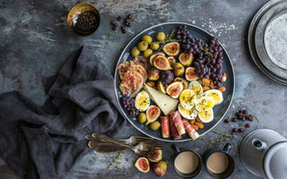 Plate full of selected fruits and high-protein snacks, ideal for getting back on keto after a slip-up