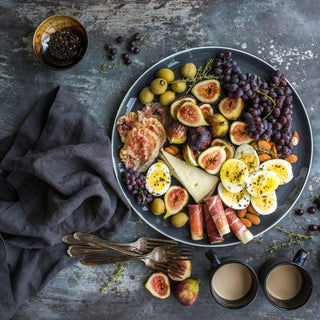 Plate full of selected fruits and high-protein snacks, ideal for getting back on keto after a slip-up